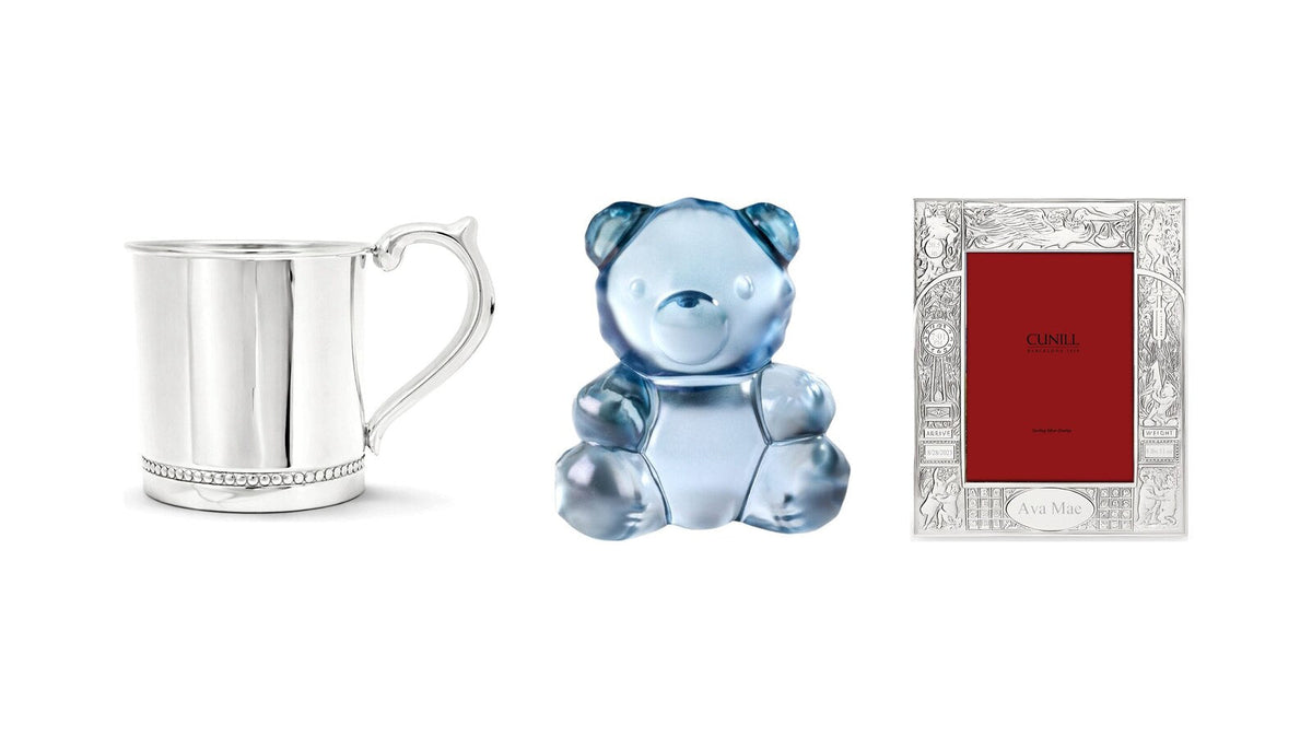 Cunill sterling silver baby cup, Lalique Teddy Air crystal bear and Cunill stork birth record frame