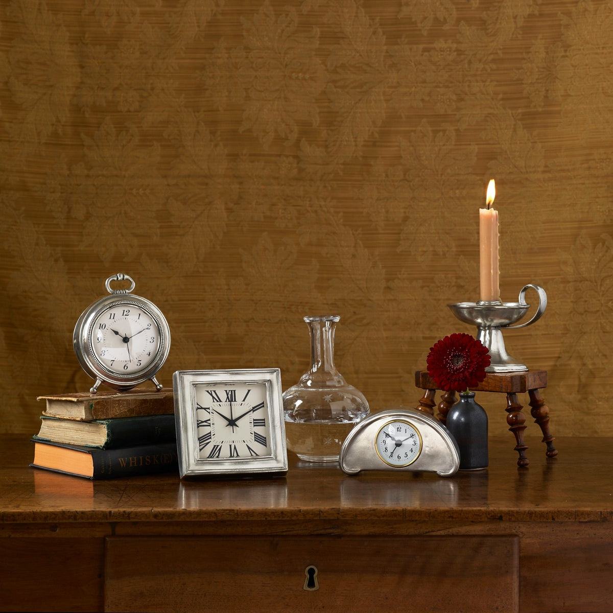 Match Pewter clocks, frames and candlesticks