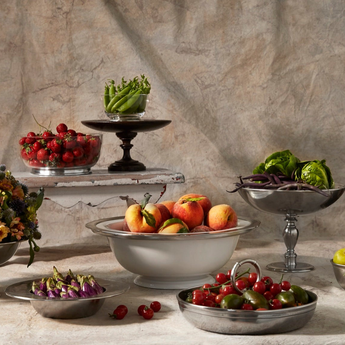 Match Pewter bowls and compotes with fruit