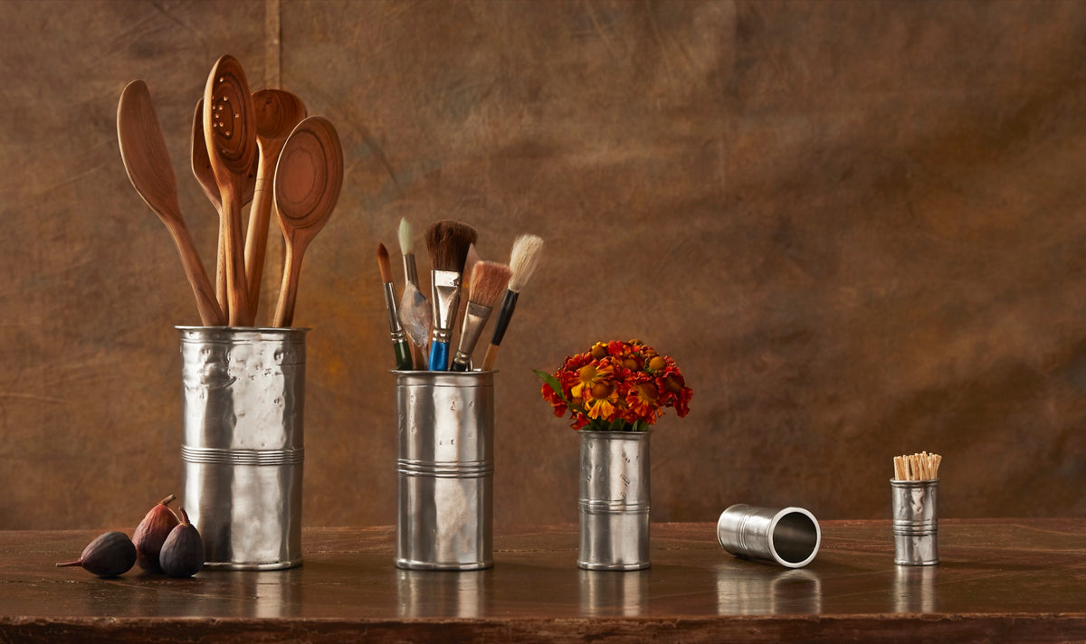 Match Pewter beakers used as utensil and brush holders