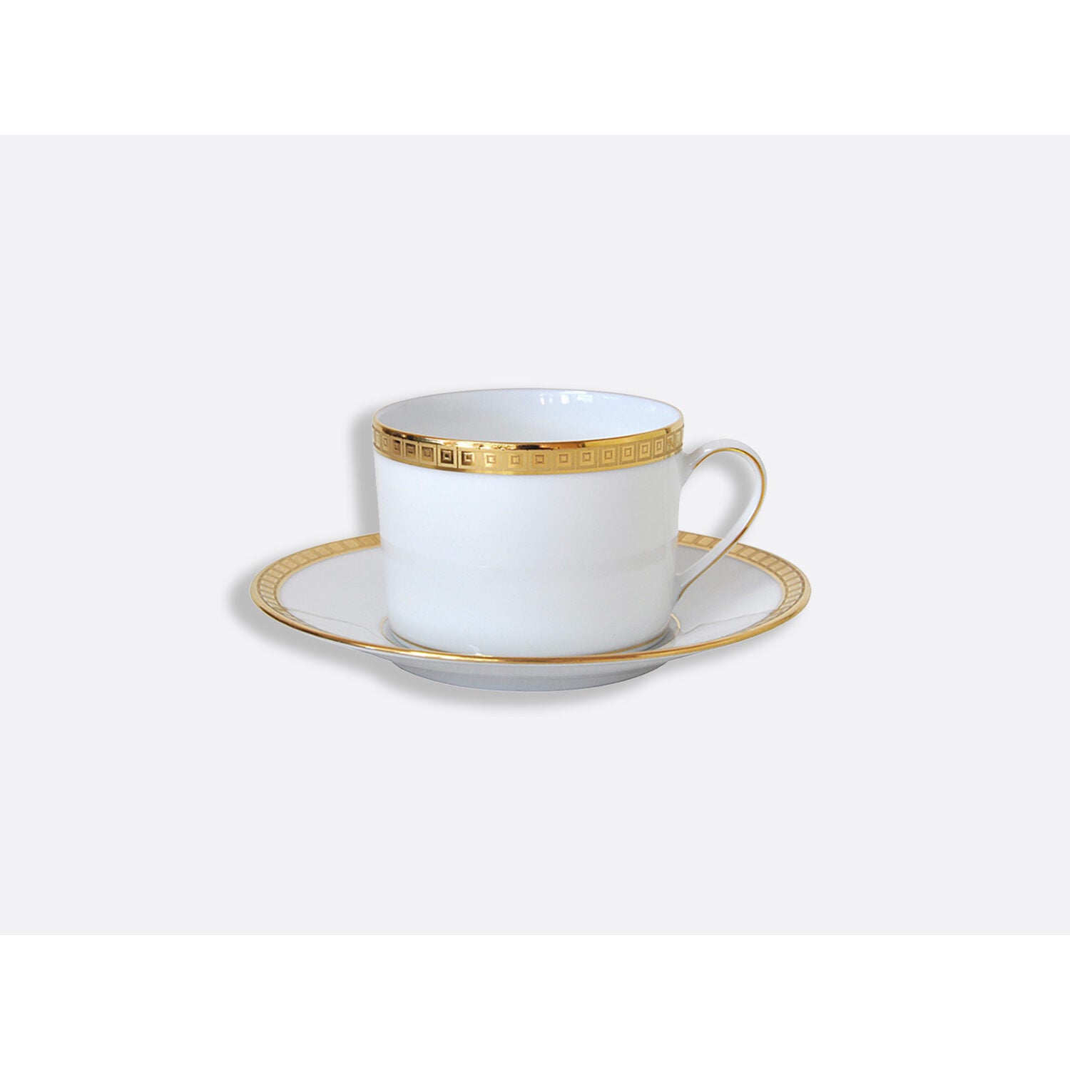 Bernardaud Tea cup and saucer 5 oz, Limoges porcelain, Athéna Or collection, on a white background