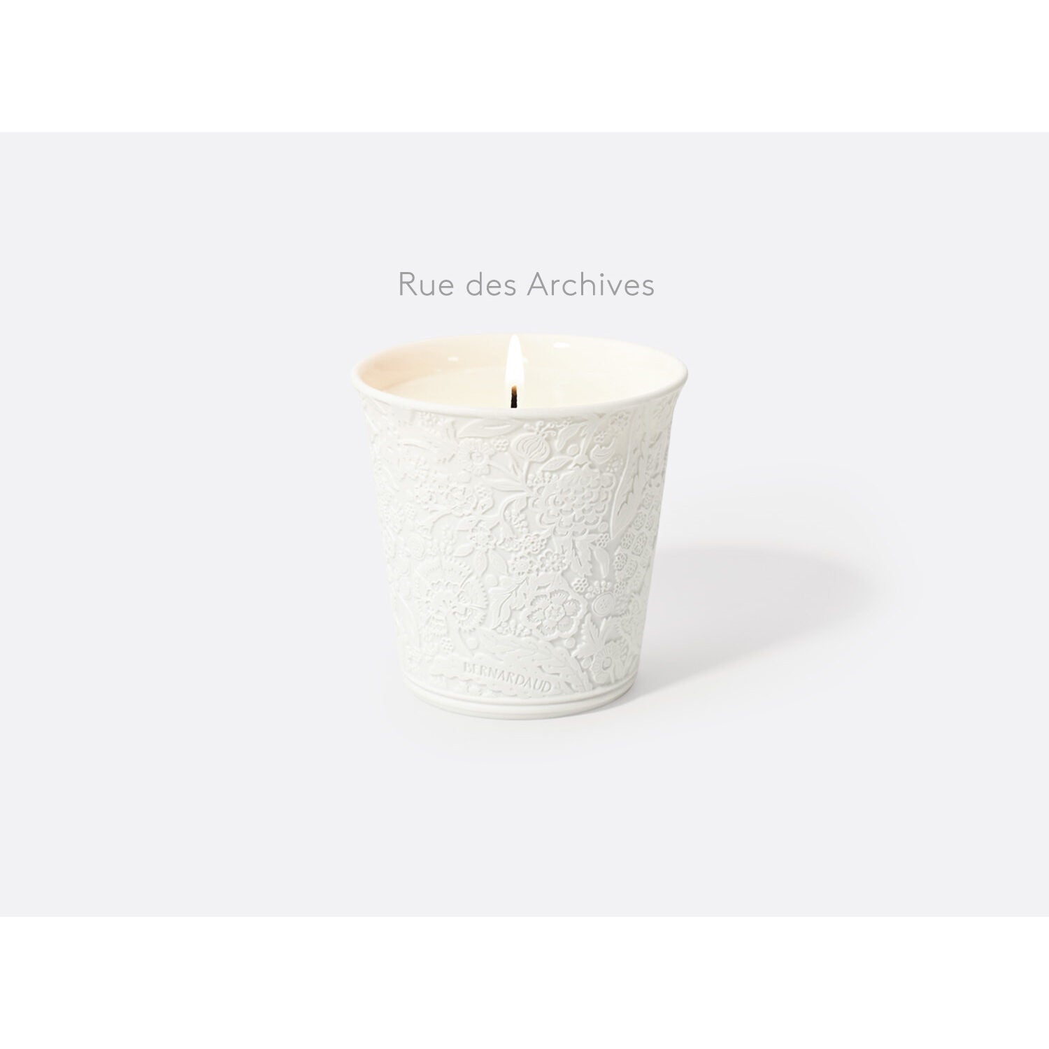 Bernardaud "Rue des Archives" refillable candle tumbler in engraved bisque porcelain 7 oz, Limoges porcelain, Home Fragrances collection, on a white background