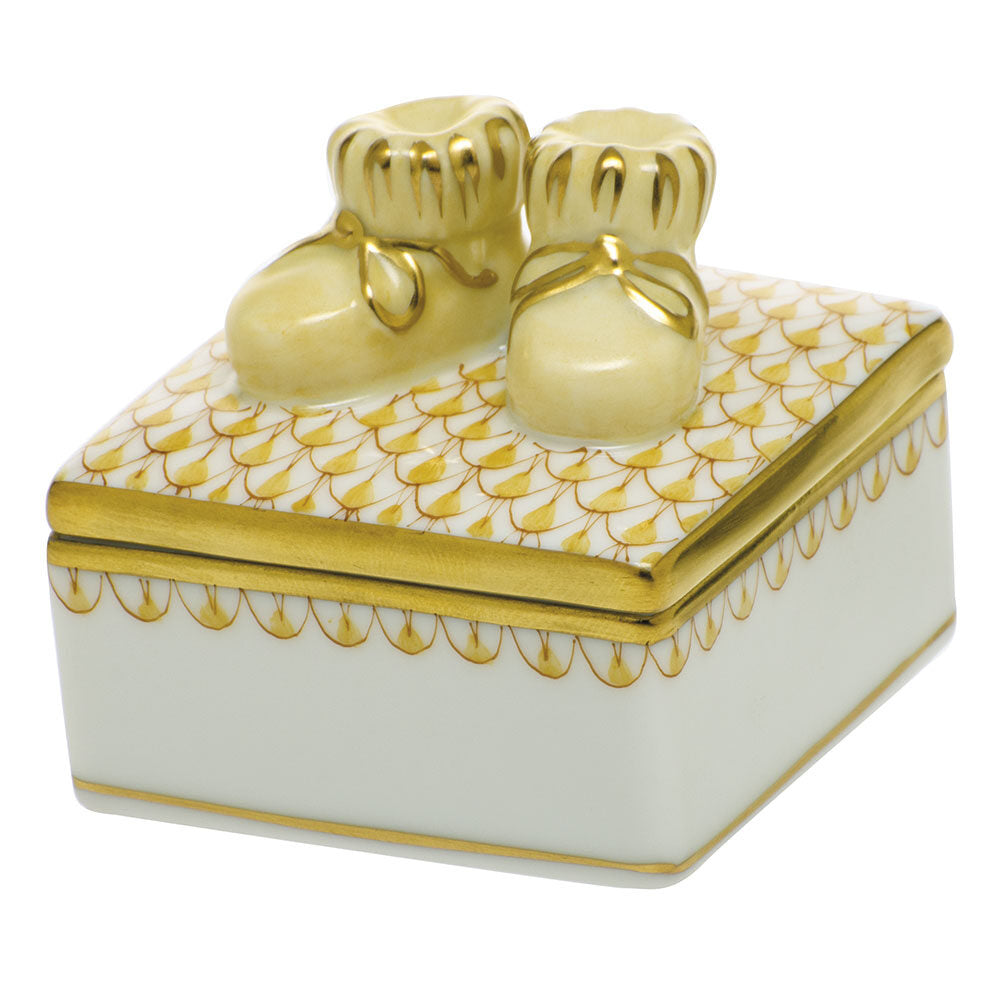 Hand-painted Herend Baby Bootie Box in Butterscotoch fishnet porcelain on a white background