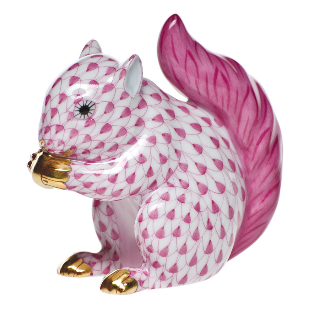 Hand-painted Herend Baby Squirrel Figurine in Raspberry fishnet porcelain on a white background