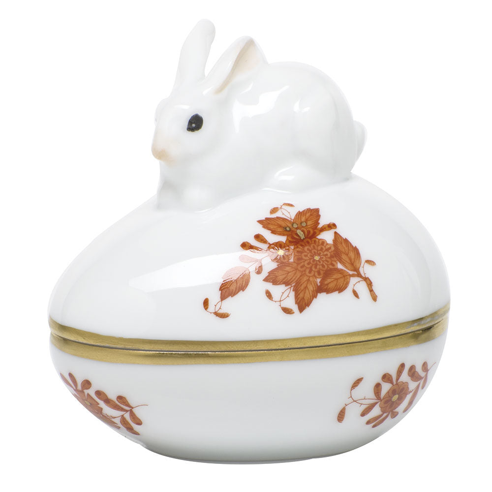 Hand-painted Herend Chinese Bouquet Rust Egg Bonbon with Bunny Candy Dish in fine porcelain, 3in L X 2.25in W X 3in H, on a white background