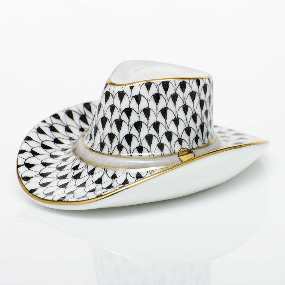 Hand-painted Herend Cowboy Hat Figurine in Black fishnet porcelain on a white background