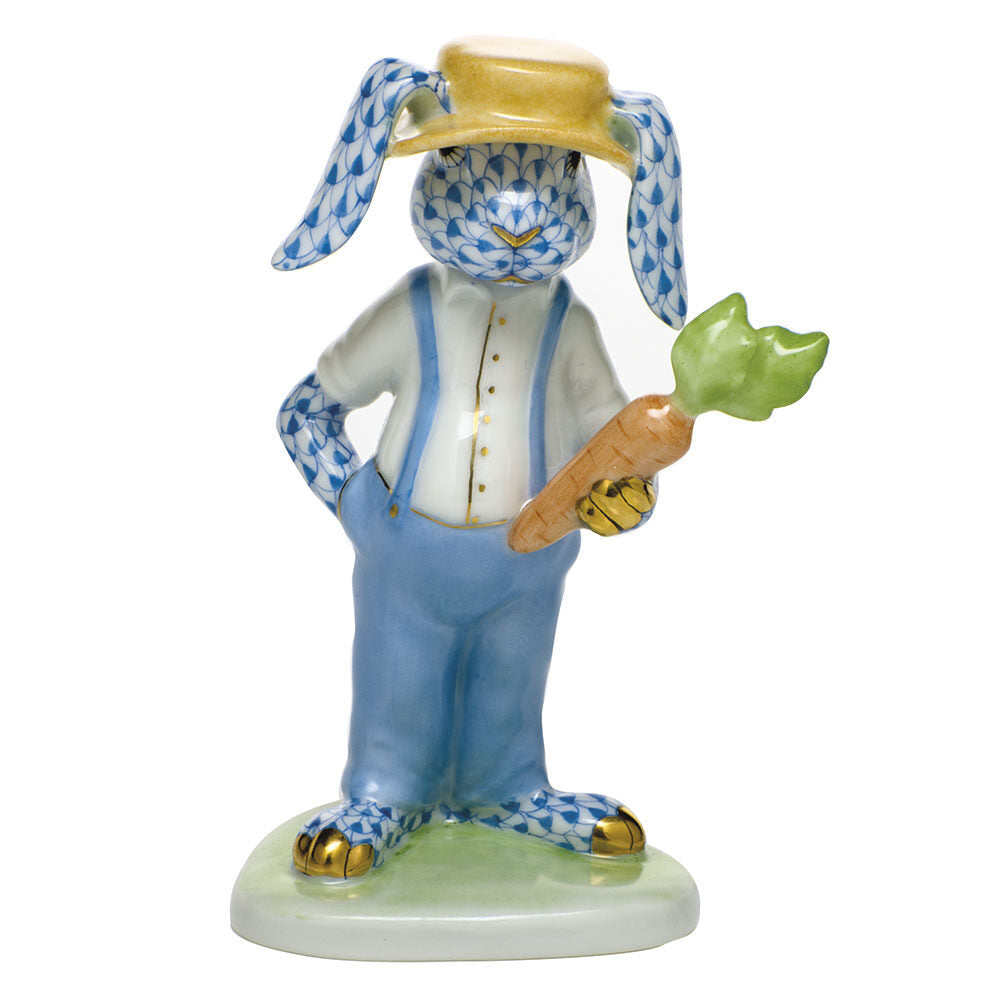Hand-painted Herend Farmer Bunny Figurine in fine porcelain, 1.75in L X 3.75in H, on a white background