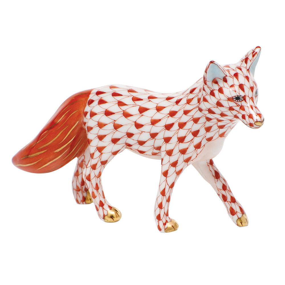Hand-painted Herend Fox Figurine in Rust fishnet porcelain on a white background