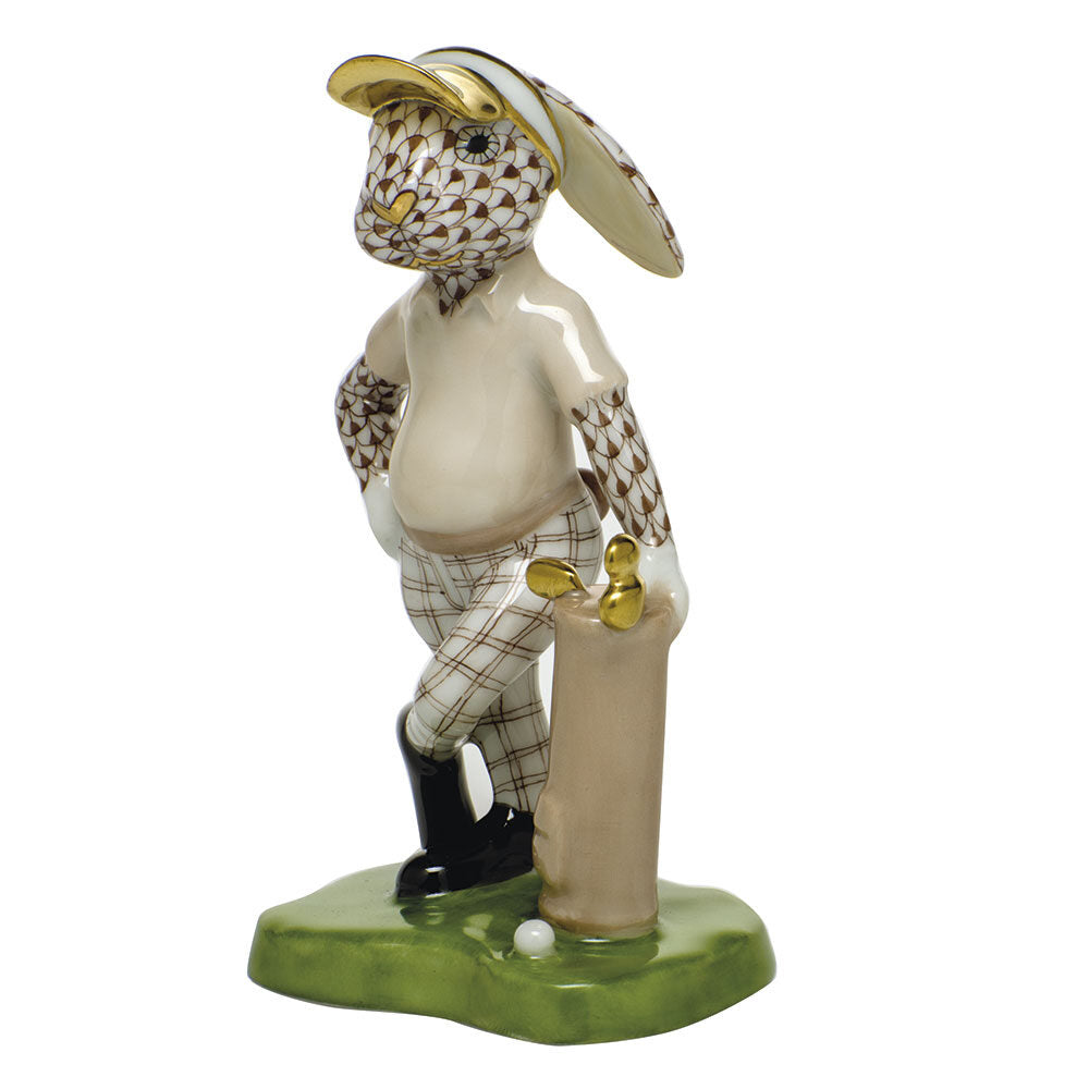 Hand-painted Herend Golf Bunny Figurine in Chocolate fishnet porcelain on a white background