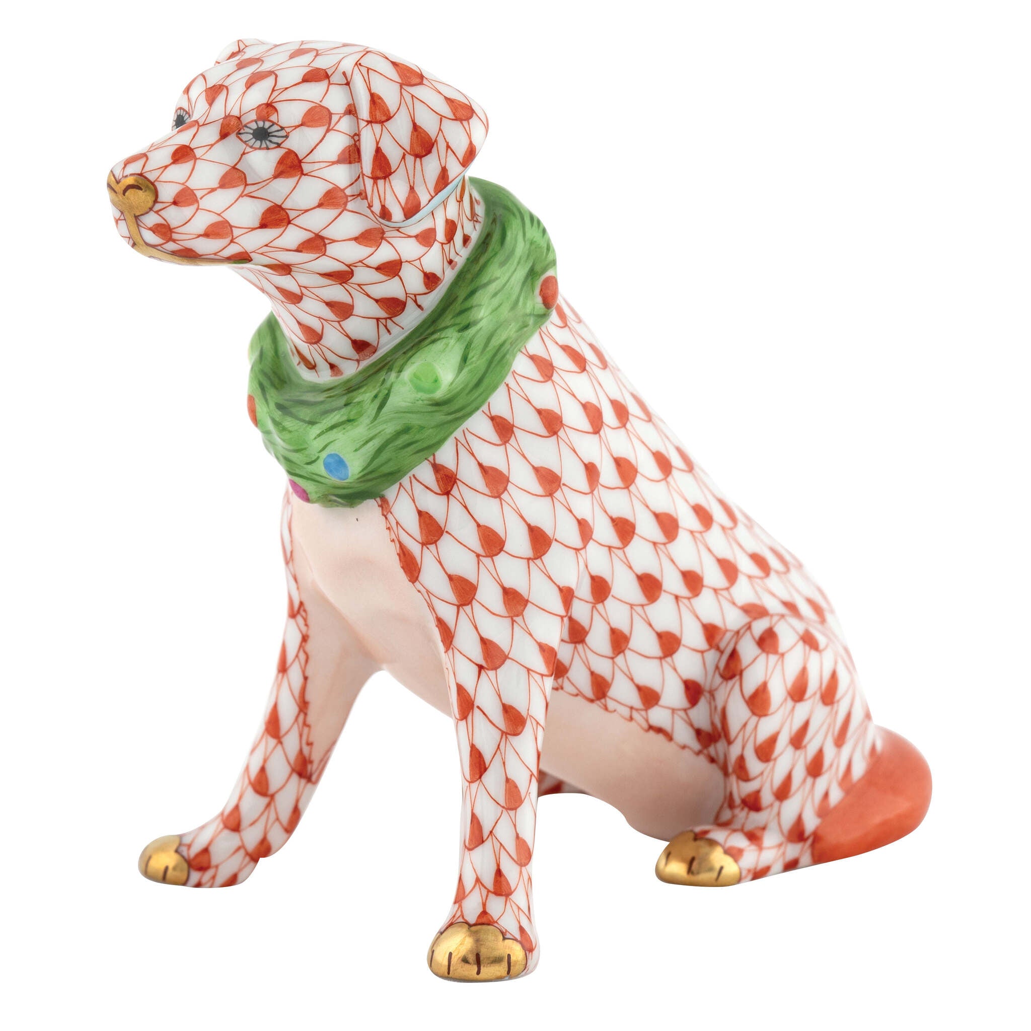 Hand-painted Herend Holiday Dog Figurine in Rust fishnet porcelain on a white background