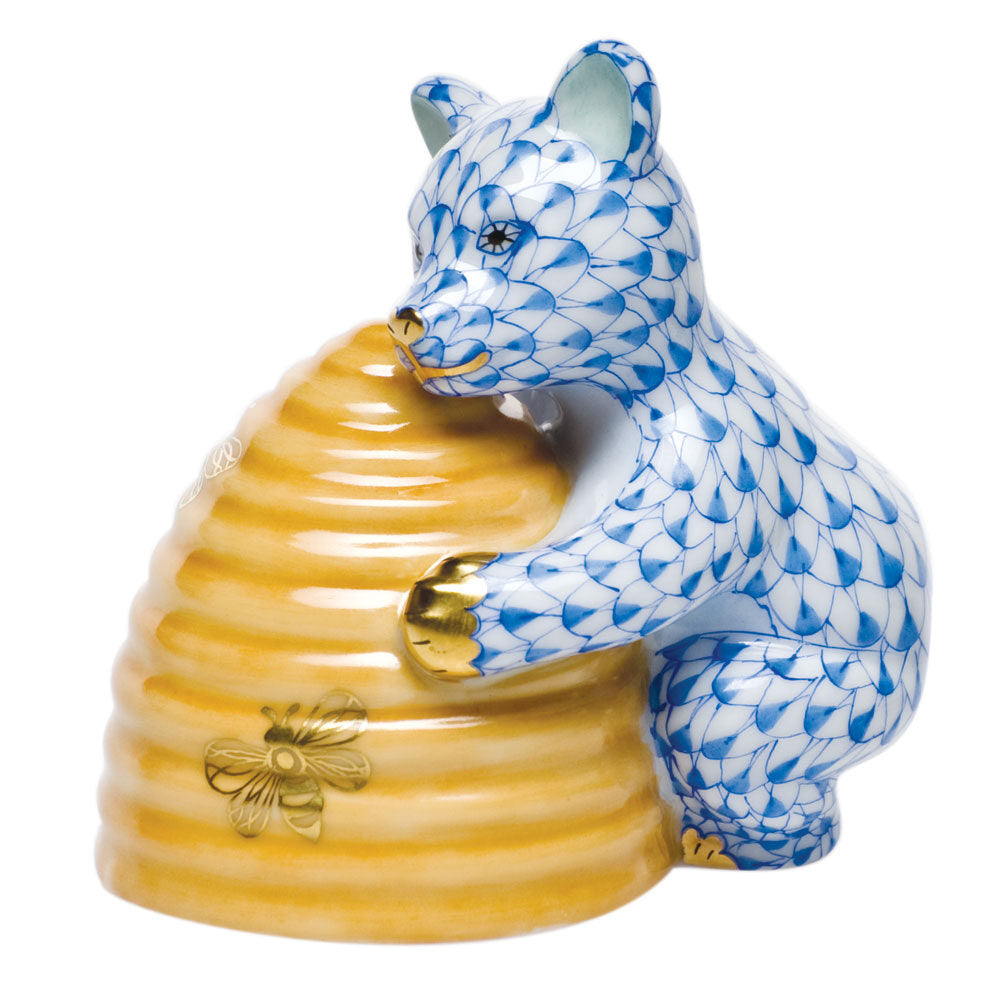 Hand-painted Herend Honey Bear Figurine in fine porcelain, 2.5in L X 2.75in H, on a white background