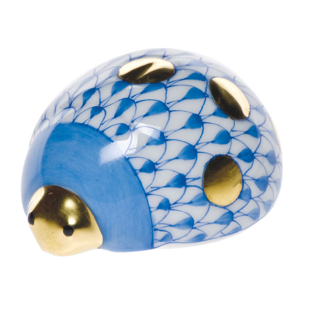 Hand-painted Herend Lucky Ladybug Figurine in Blue fishnet porcelain on a white background