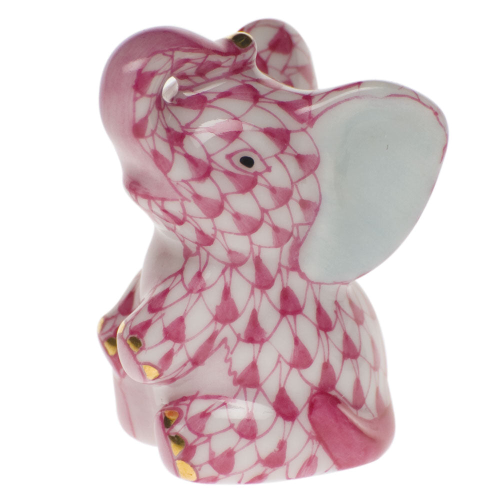 Hand-painted Herend Miniature Baby Elephant Figurine in Raspberry fishnet porcelain on a white background