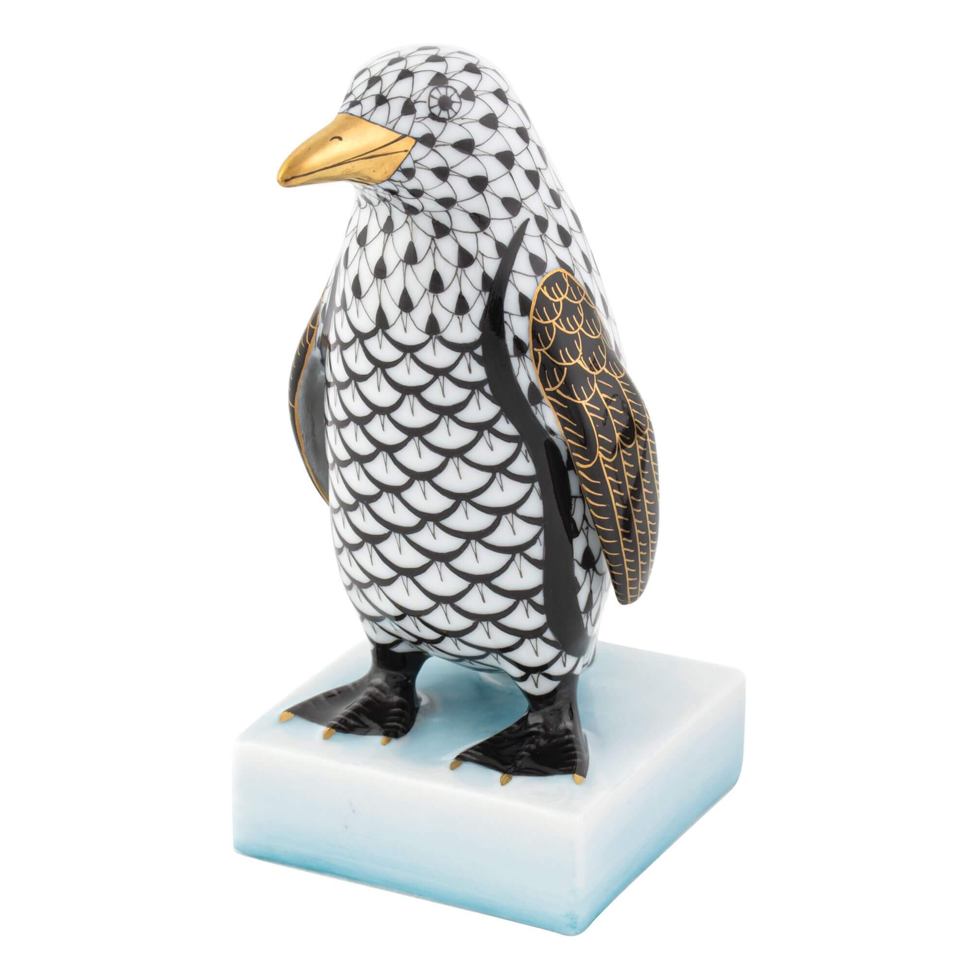 Hand-painted Herend Penguin Figurine in Black fishnet porcelain on a white background
