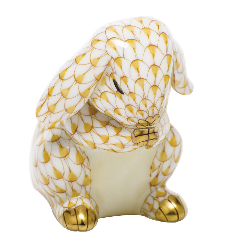 Hand-painted Herend Praying Bunny Figurine in Butterscotch fishnet porcelain on a white background