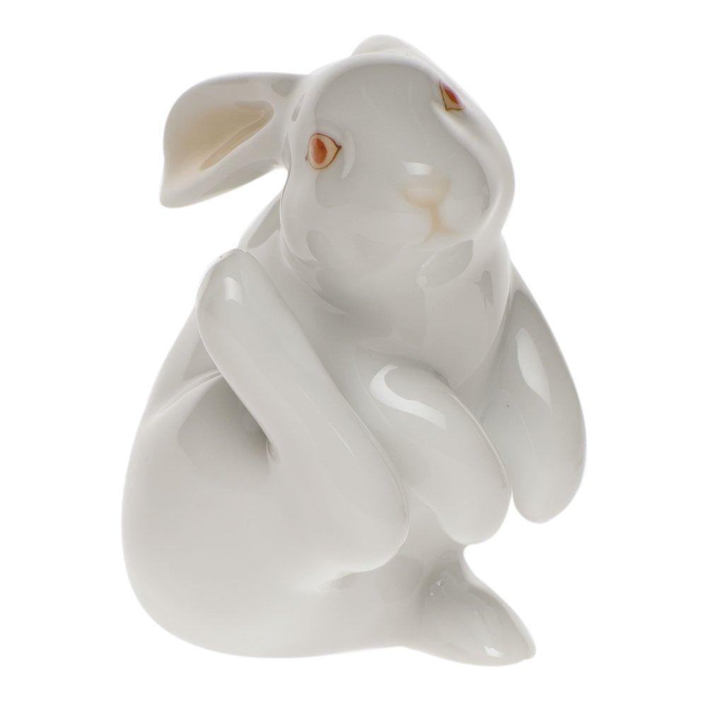 Scratching Bunny Figurine in hand-painted White porcelain by Herend of Hungary