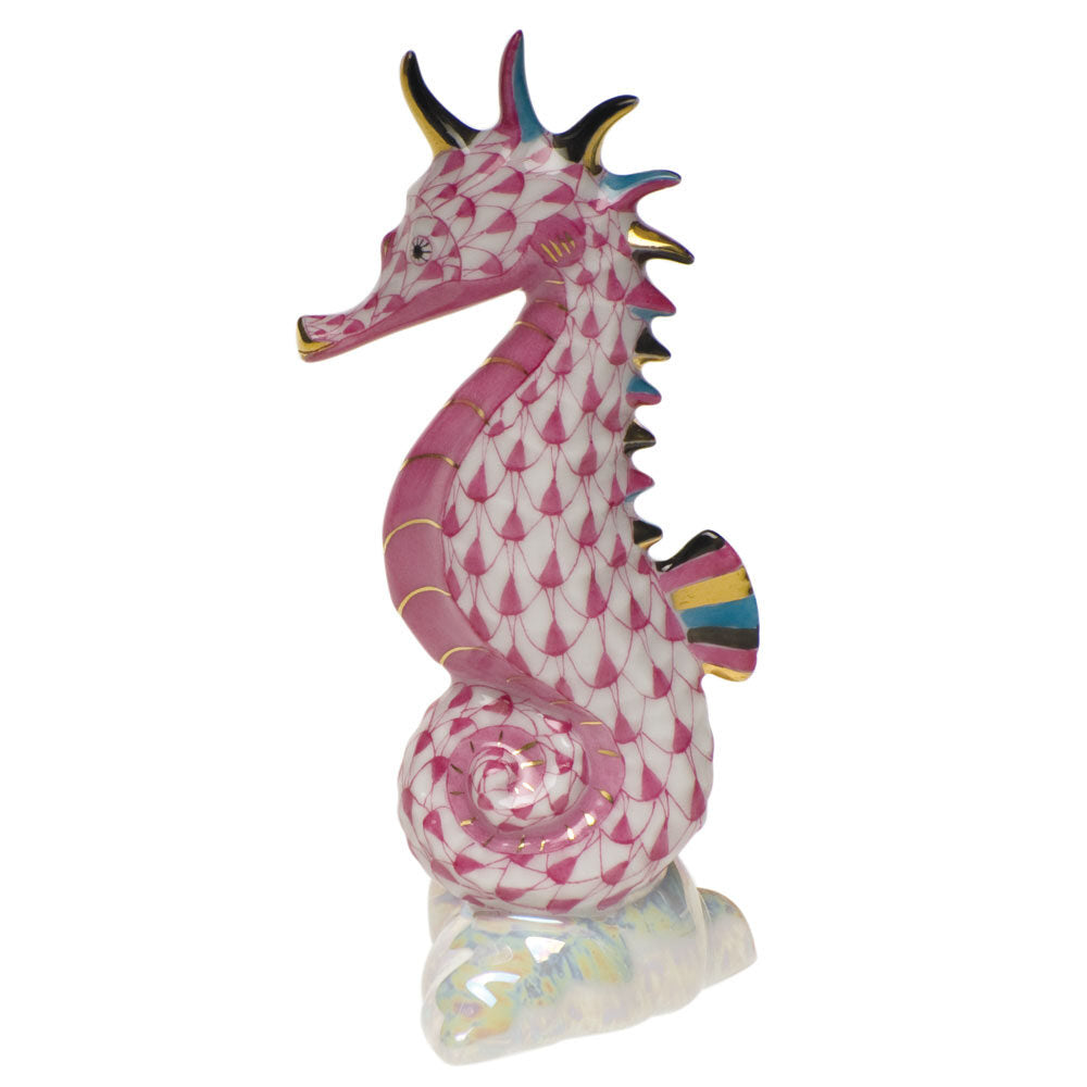 Hand-painted Herend Sea Horse Figurine in Raspberry fishnet porcelain on a white background