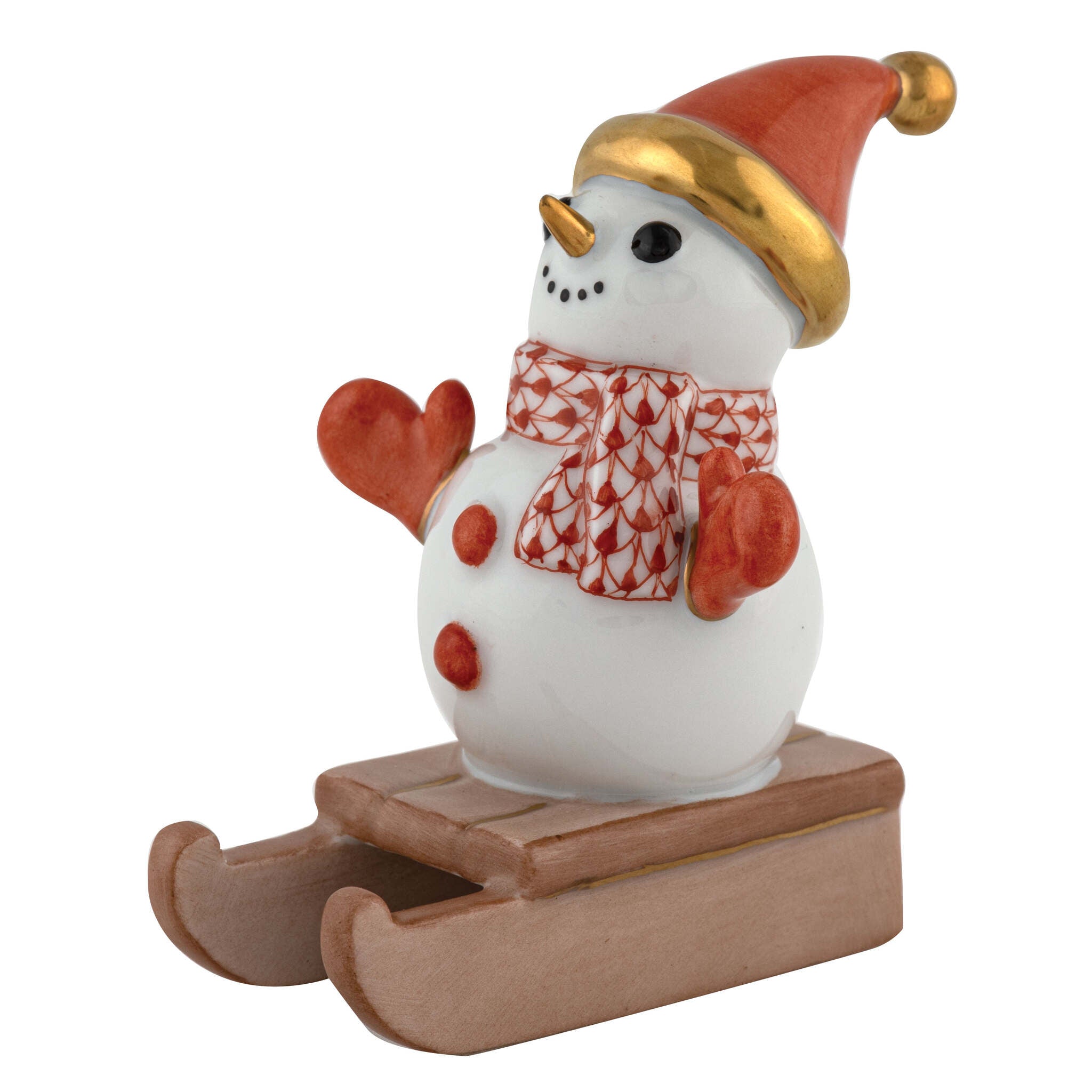 Herend Sledding Snowman Figurine porcelain figurine painted in the Rust fishnet pattern