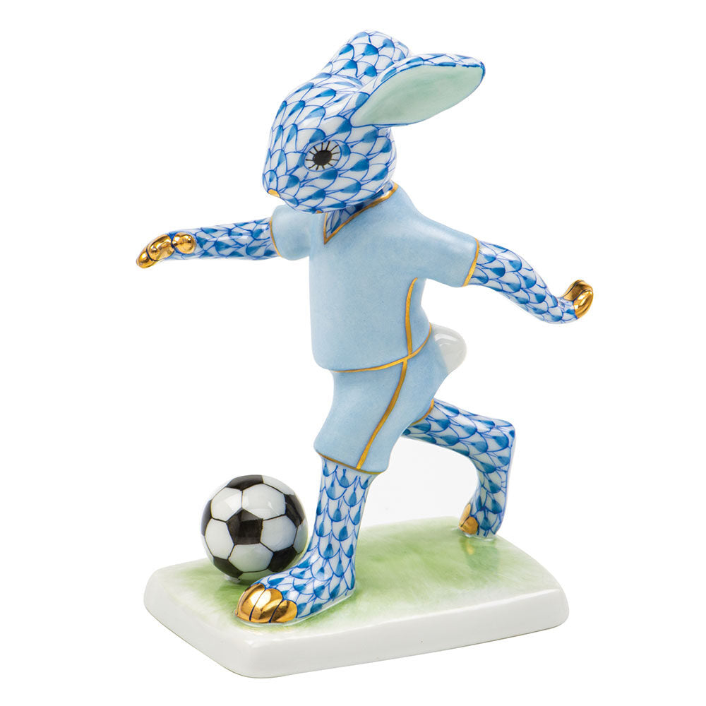 Hand-painted Herend Soccer Bunny Figurine in Blue fishnet porcelain on a white background