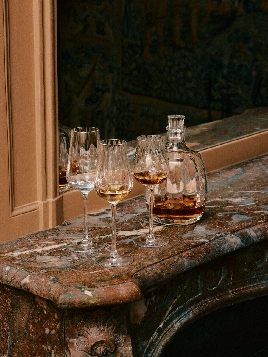 Saint-Louis Twist 1586 Spirits Glasses, Set of 2 in a styled lifestyle setting