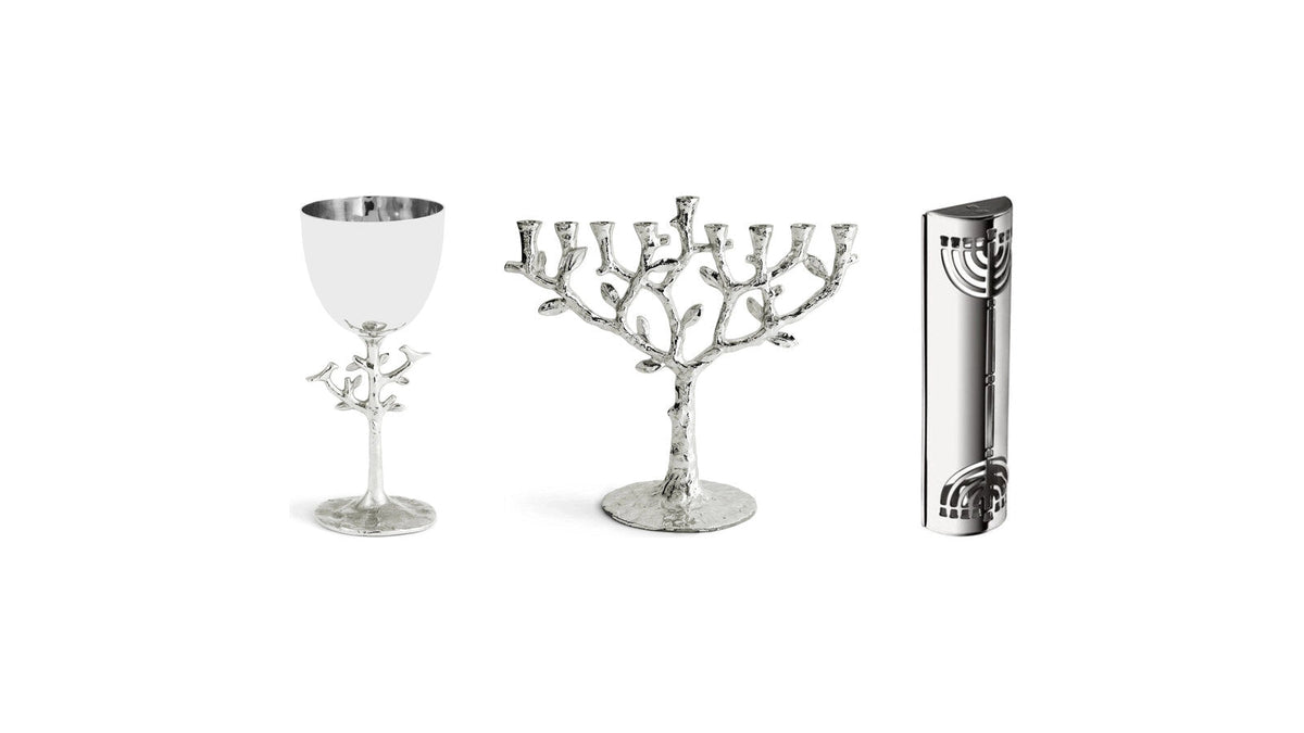 Michael Aram Tree of Life menorah and kiddush cup with a Christofle silver-plated mezuzah