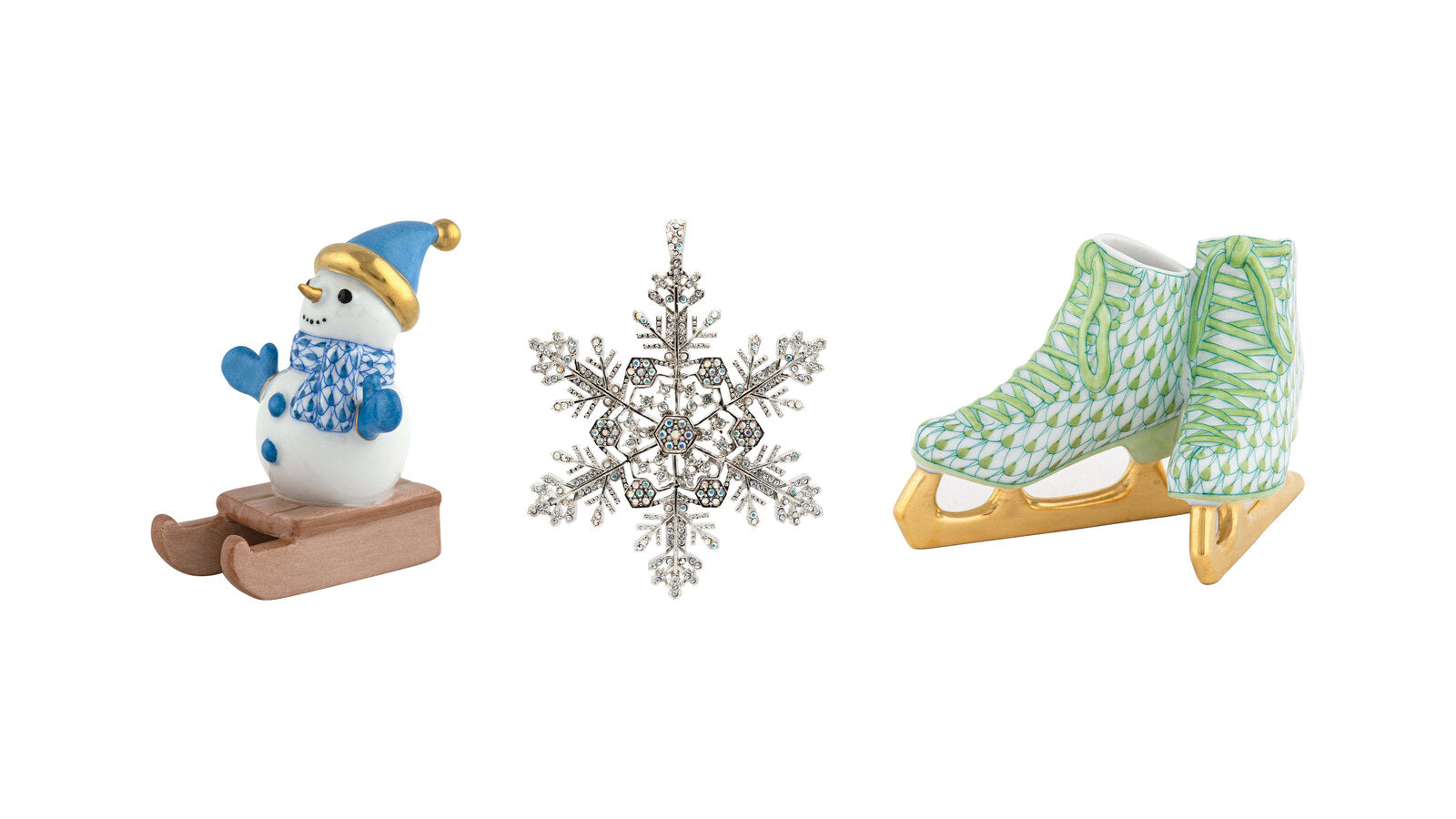 Herend sledding snowman, Jay Strongwater 2026 snowflake ornament and Herend ice skates figurine
