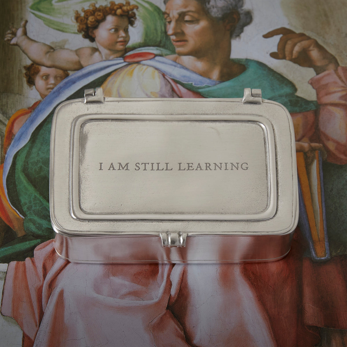 Match Pewter Michelangelo box engraved 'I am still learning'