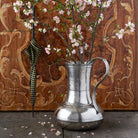 Match Pewter umbrella stand with spring branches