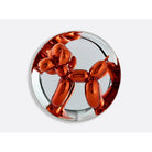 Bernardaud Balloon Dog (Orange) by Jeff Koons, Limoges porcelain, on a white background