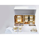 Bernardaud Large tea gift case (teapot, creamer, sugar bowl, 6 tea cups and saucers), Limoges porcelain, Botanique collection, on a white background
