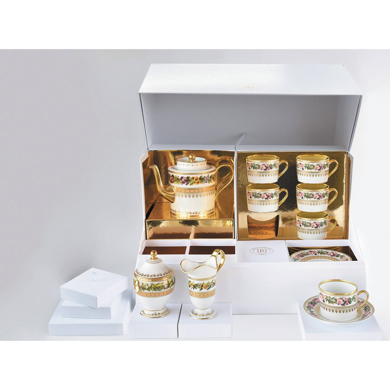 Bernardaud Large tea gift case (teapot, creamer, sugar bowl, 6 tea cups and saucers), Limoges porcelain, Botanique collection, on a white background