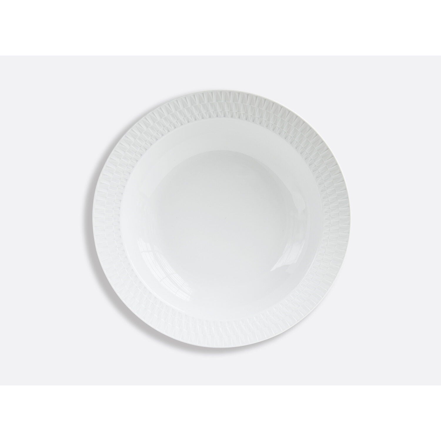 Bernardaud Deep round dish 11.5" Twist, Limoges porcelain, on a white background