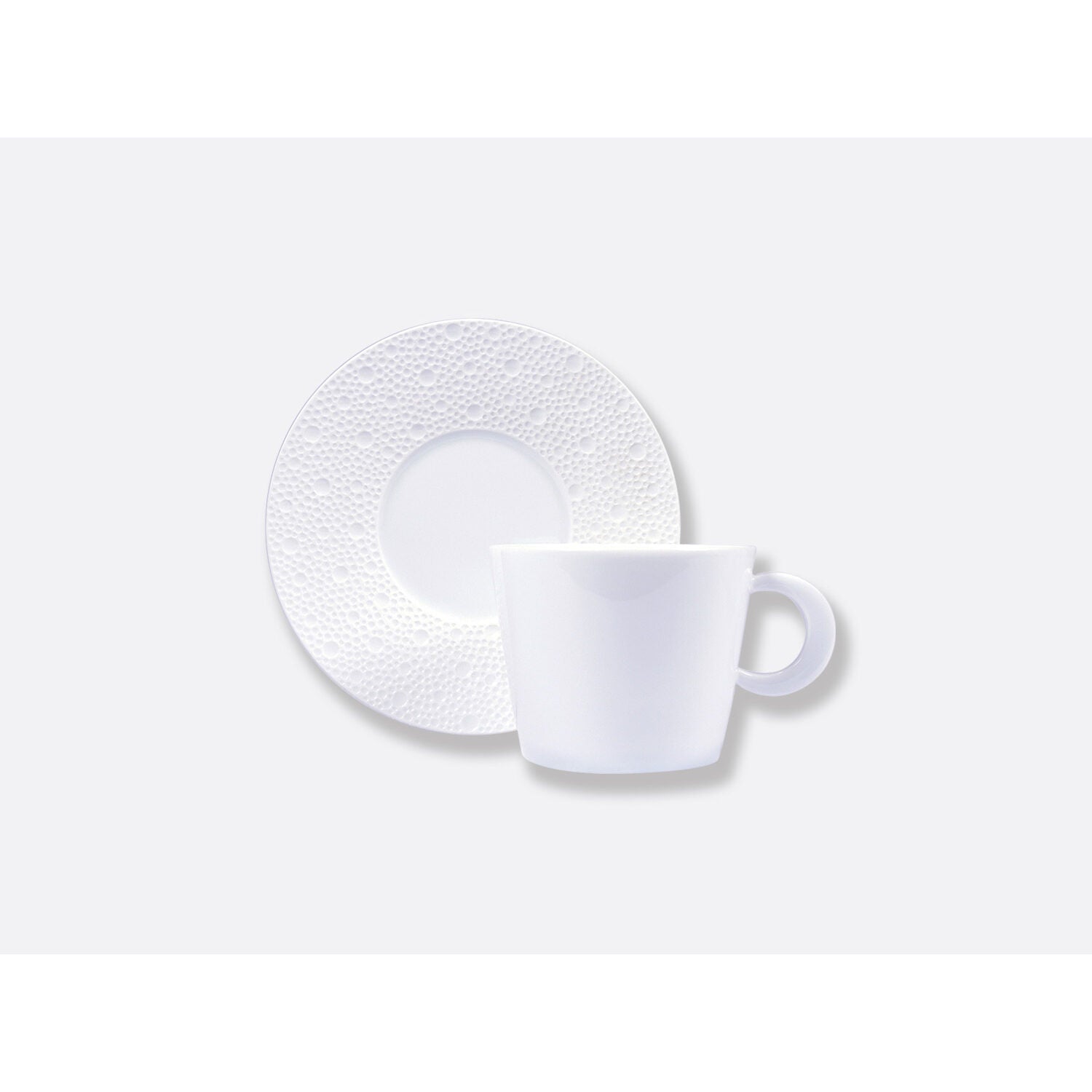 Bernardaud Tea cup & saucer 5.7 oz, Limoges porcelain, Ecume JP collection, on a white background