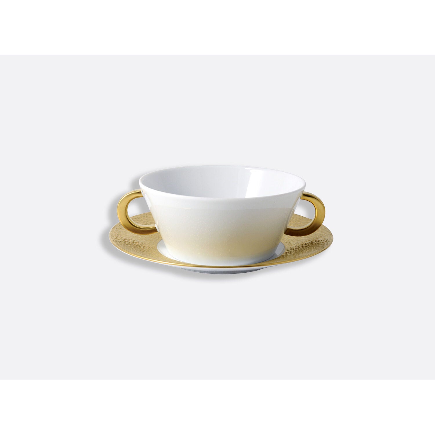 Bernardaud Bouillon cup and saucer, Limoges porcelain, Ecume Or collection, on a white background