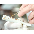 Bernardaud Set of 2 Miroir Argent blade table knives, Limoges porcelain, Kintsugi - Sarkis collection, detail view