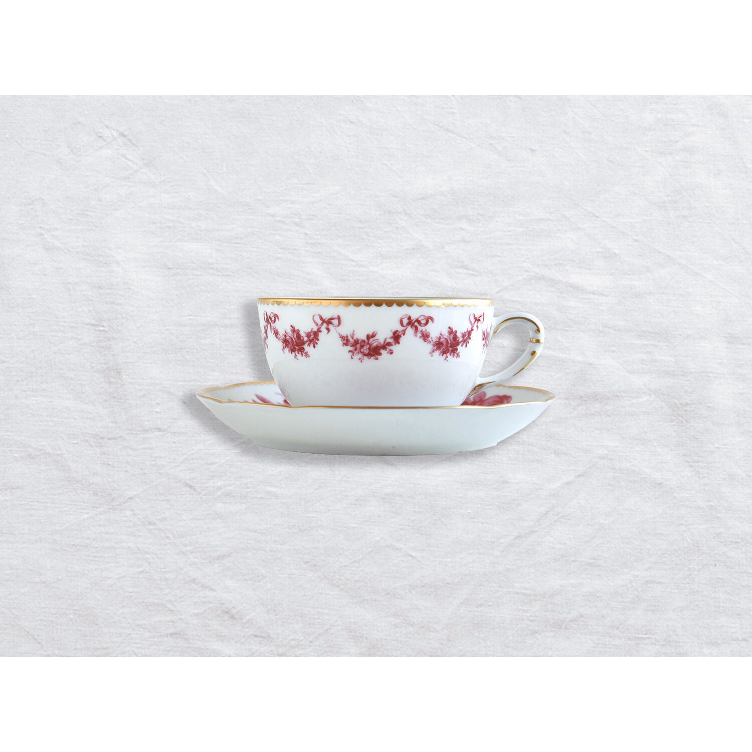 Bernardaud Tea cup and saucer, Limoges porcelain, Louis XV collection, on a white background