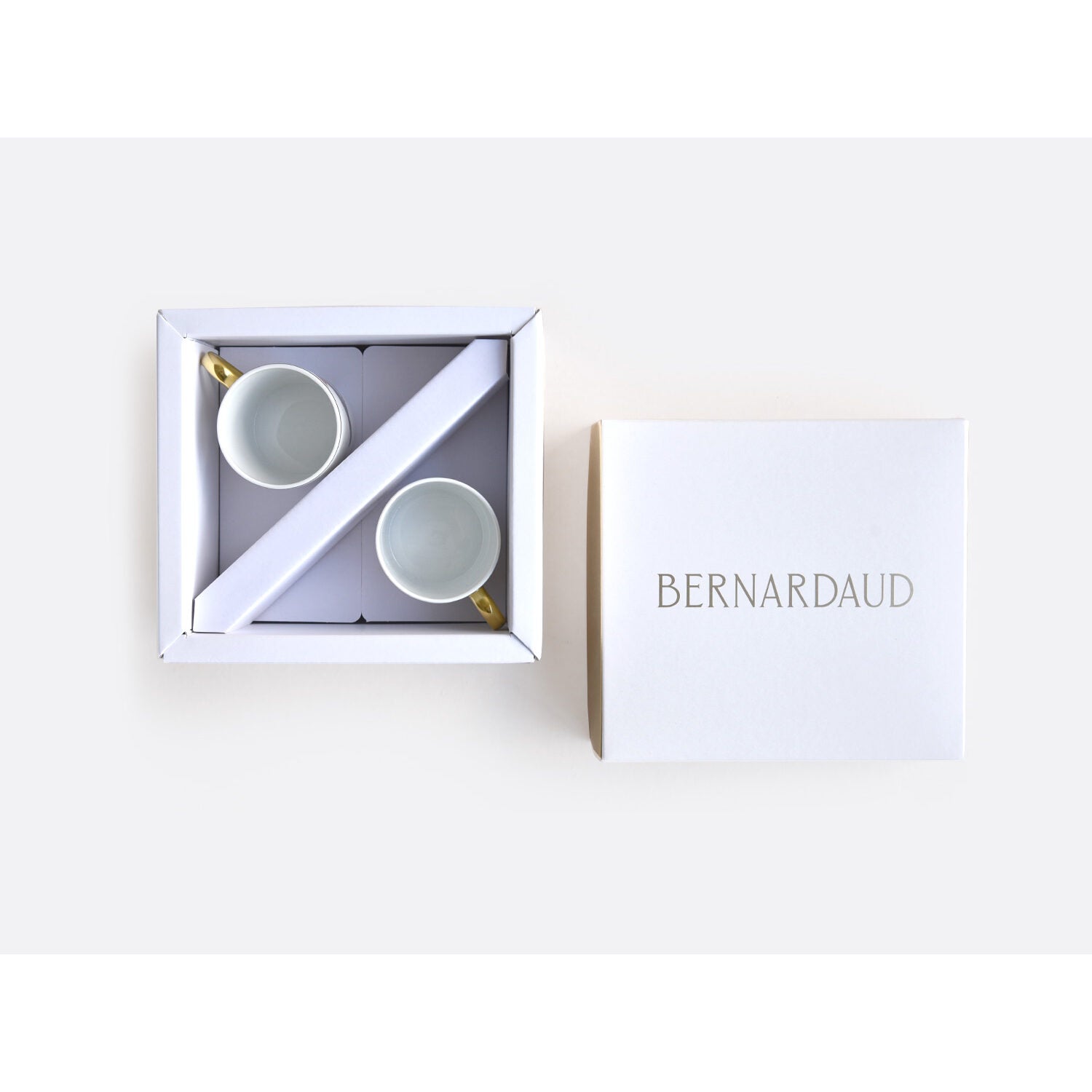 Bernardaud Set of 2 handle-less espresso cups and saucers 2.4 oz, Limoges porcelain, detail view