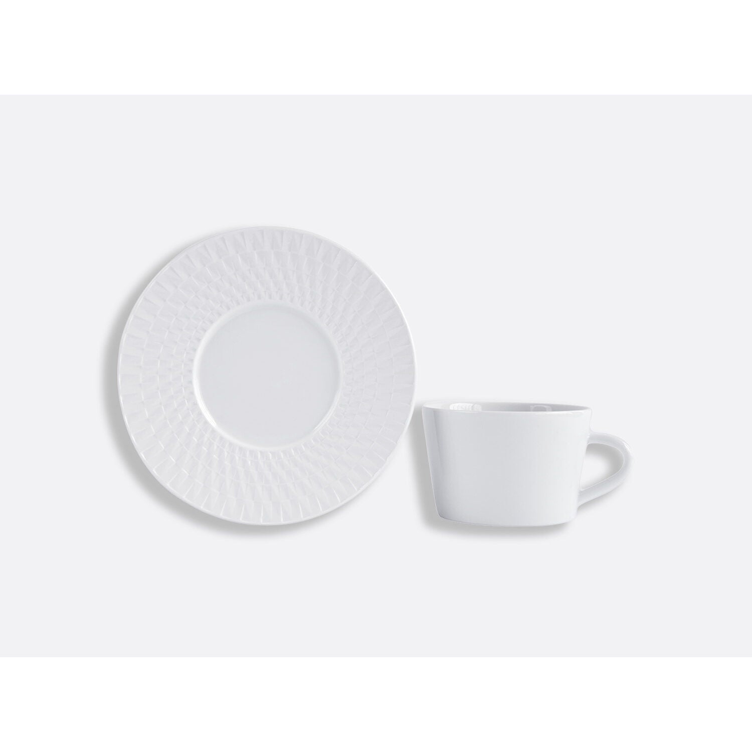Bernardaud Tea cup and saucer 5 oz Twist, Limoges porcelain, on a white background