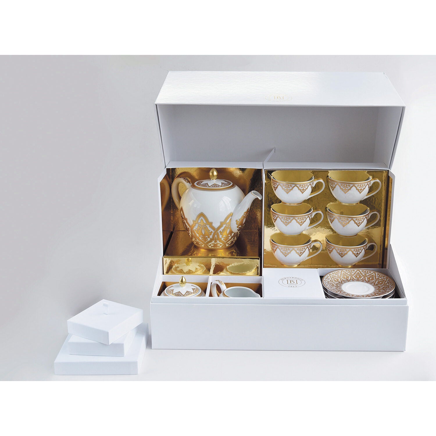 Bernardaud Tea gift case (teapot, creamer, sugar bowl, 6 tea cups and saucers), Limoges porcelain, Venise collection, on a white background