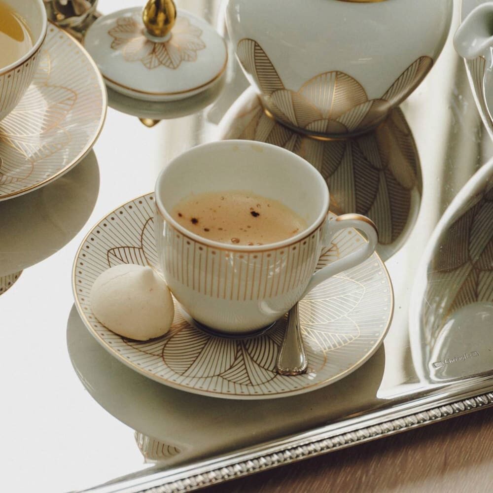Christofle Malmaison 2 Porcelain Coffee Cup and Saucers Gold Finish in porcelain on a white background