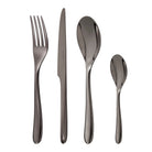 Christofle L'Ame de Christofle 4-Piece Black Stainless Steel Flatware Set in stainless steel on a white background