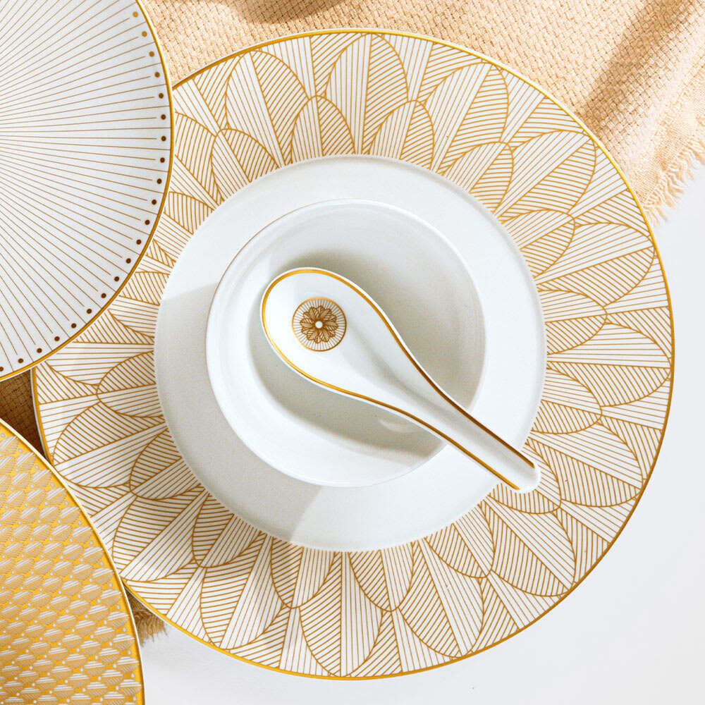 Christofle Malmaison Porcelain Chinese Spoon Gold Finish in porcelain on a white background