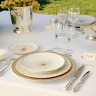 Christofle Malmaison Dessert Plate Porcelain Gold in porcelain on a white background