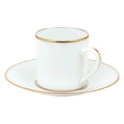 Christofle Gilded Porcelain Demitasse Cup and Saucer in porcelain on a white background