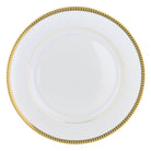 Christofle Malmaison Gilded Porcelain Dinner Plate in porcelain on a white background