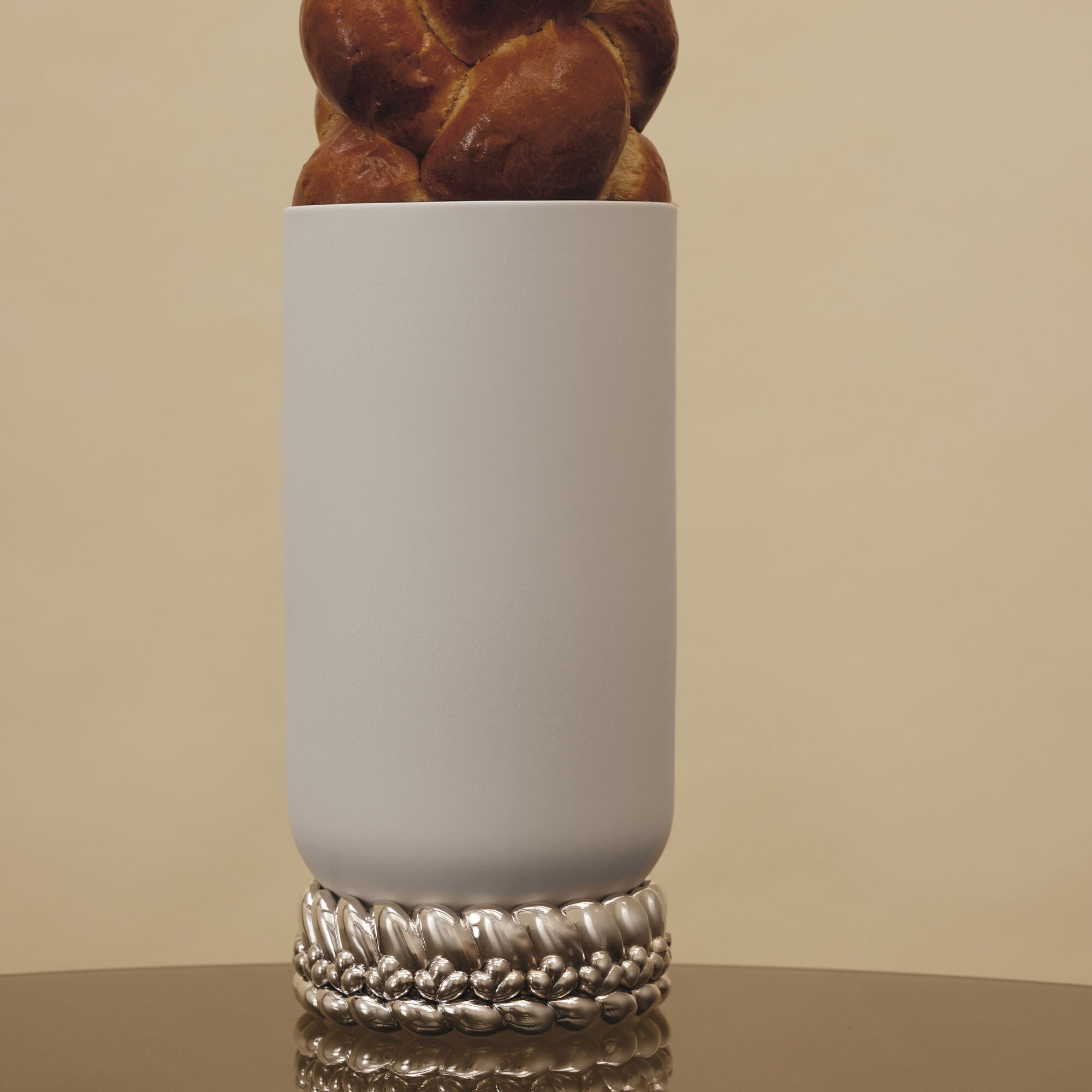 Christofle Babylone Large Porcelain Vase in sterling silver on a white background
