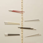 Christofle Silver-Plated White Chinese Chopsticks in silver-plate on a white background