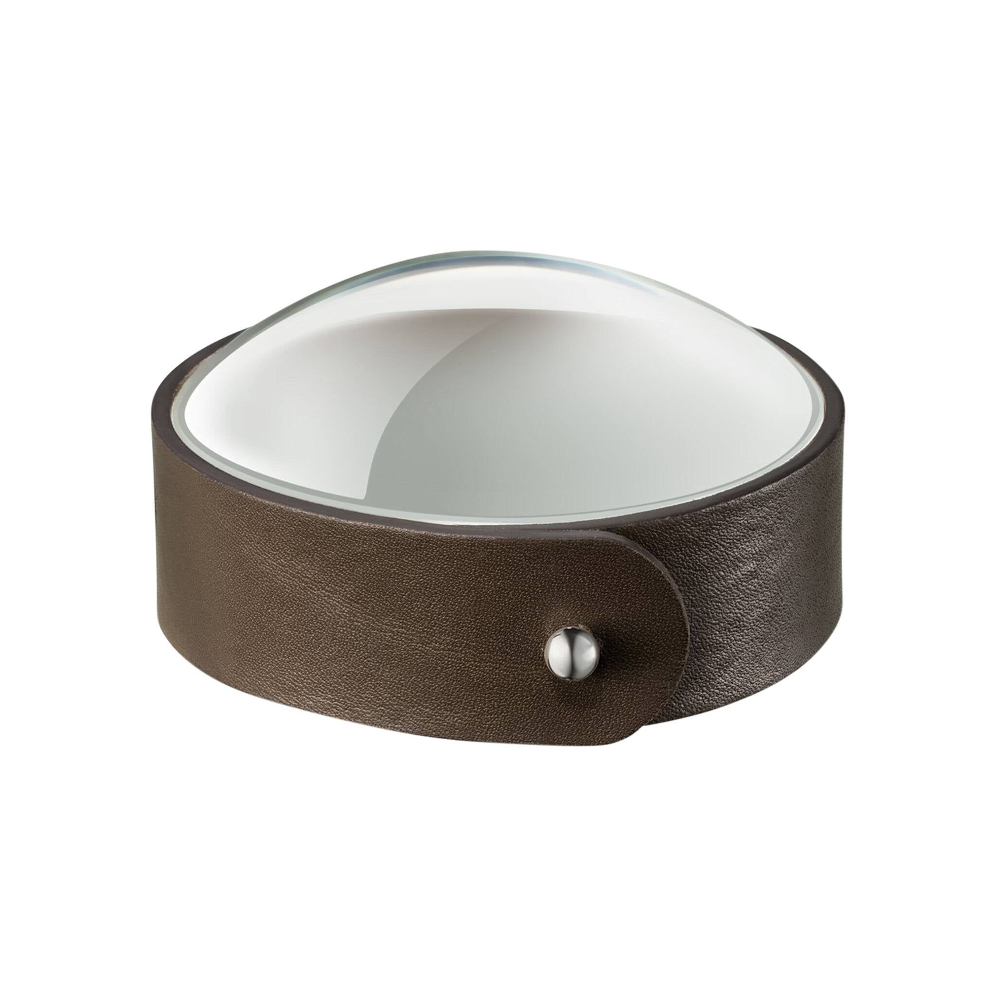 Christofle Glass & Bronze Leather Paperweight in leather on a white background