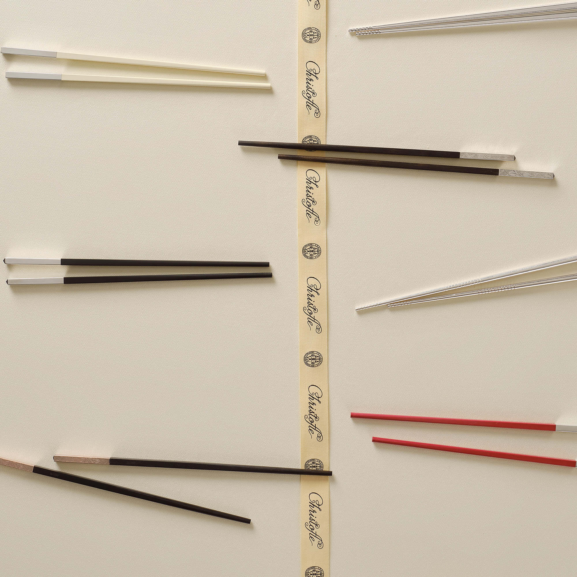 Christofle Silver-Plated Black Japanese Chopsticks in silver-plate on a white background