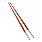 Christofle Silver-Plated Red Japanese Chopsticks in silver-plate on a white background